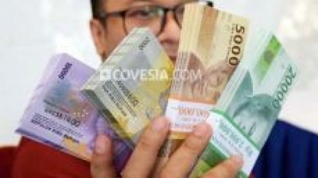 Sentimen Virus Covid-19, Rupiah Terpuruk di Atas Rp14.000 per USD