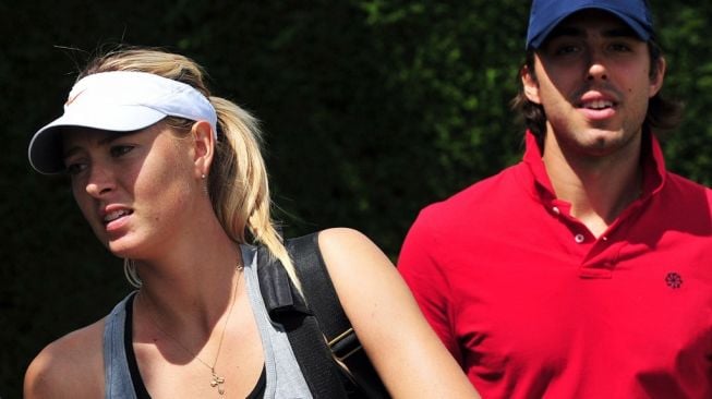 Maria Sharapova dan Sasha Vujacic. [AFP/Leon Neal]