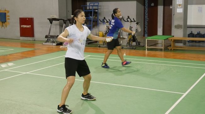 Para atlet bulutangkis Indonesia menjalani latihan rutin di Pelatnas PBSI, Cipayung, Jakarta Timur, Kamis (19/3/2020). [Humas PBSI]