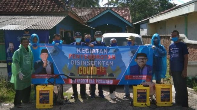 Partai NasDem Pesawaran Laksanakan Penyemprotan Disinfektan