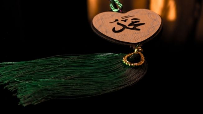 Ilustrasi kaligrafi nama Nabi Muhammad berbentuk hati. (Shutterstock)