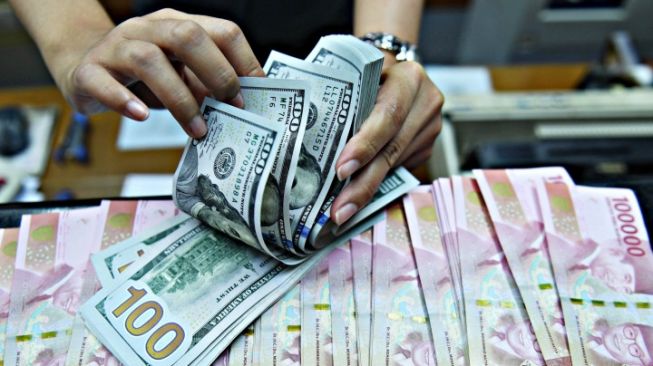 Rupiah Menguat Tembus Rp 15.840 Per Dolar AS