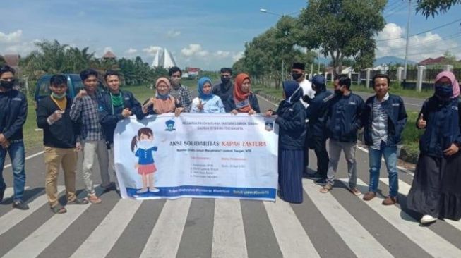 Kapas Tastura Bagikan Pengguna Jalan Masker Gratis