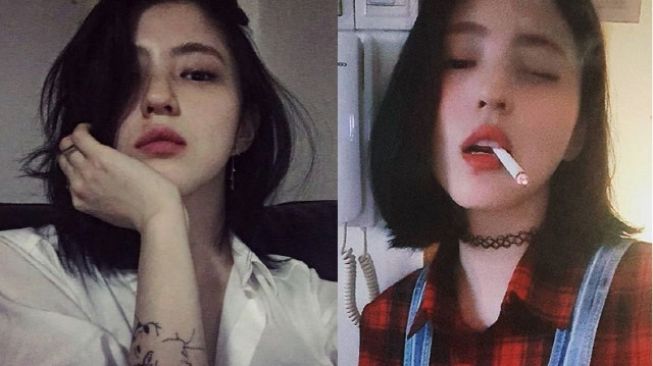 Han So Hee yang merokok dan memiliki tato di lengannya.