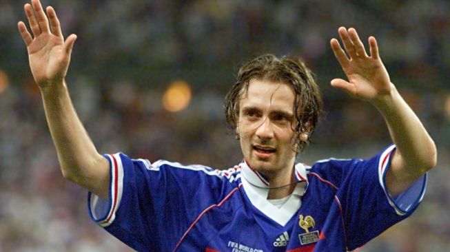 Christophe Dugarry saat memperkuat Timnas Prancis di Piala Dunia 1998 lalu. [GABRIEL BOUYS / AFP]