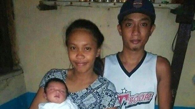 Pasangan suami istri asal Filipina, John Tupas dan Colline Tabes, bersama bayi perempuan mereka yang belum lama ini lahir dan diberi nama Covid Marie. [Instagram]