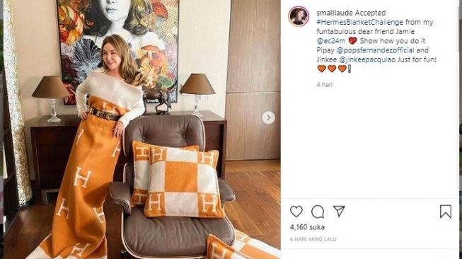 Sosialita ikut tantangan selimut Hermes. (Instagram/@smalllaude)