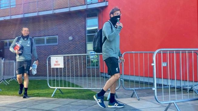 Manajer Liverpool, Jurgen Klopp tiba di markas latihan klub di Melwood, Liverpool, Inggris, Rabu (20/5/2020). [Laman resmi Liverpool]