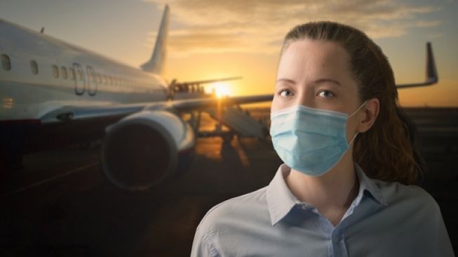 Aman Naik Pesawat Terbang di Tengah Pandemi Covid-19. (Shutterstock)