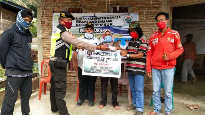 Penyaluran BLT dan BST di Kecamatan Mehalaan Berjalan Lancar