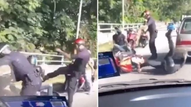 Polisi tendang seseorang di pinggir jalan. (Facebook)