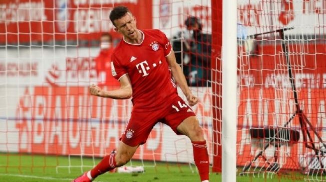 Gelandang Bayern Munich Ivan Perisic melakukan selebrasi setelah menjebol gawang Eintracht Frankfurt di semifinal Piala Jerman. Kai PFAFFENBACH / POOL / AFP