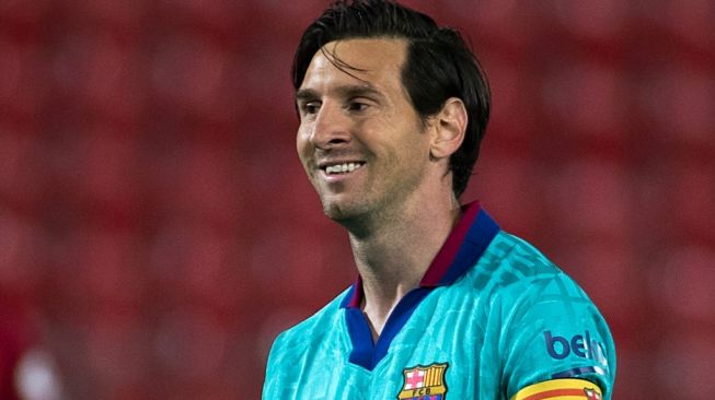 Gestur megabintang sekaligus kapten Barcelona, Lionel Messi pada laga lanjutan Liga Spanyol 2019/2020 kontra Real Mallorca di Estadi de Son Moix, Palma de Mallorca, Minggu (14/6/2020) dini hari WIB. [JAIME REINA / AFP]