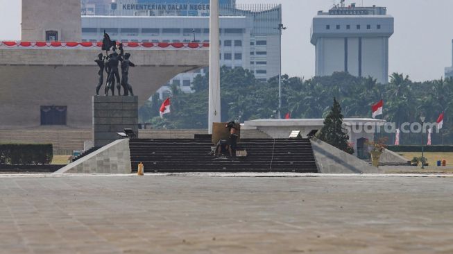 Suasana Monumen Nasional (Monas) di Jakarta Pusat, Kamis (18/6). [Suara.com/Alfian Winanto]