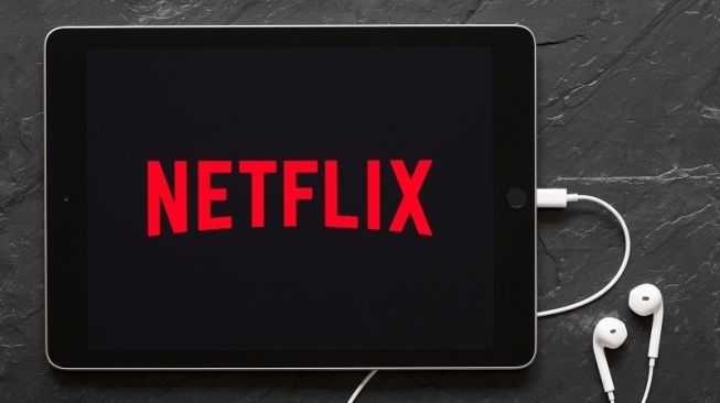 Logo Netflix di sebuah tablet. [Shutterstock]