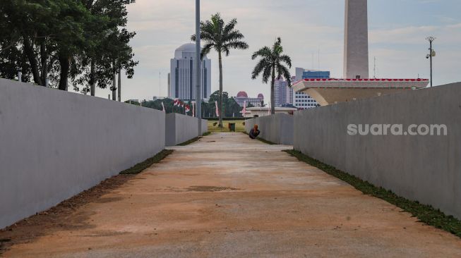 Suasana Monumen Nasional (Monas) di Jakarta Pusat, Kamis (18/6). [Suara.com/Alfian Winanto]
