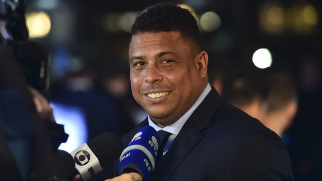 Legenda sepak bola Brasil dan pemilik Real Valladolid saat ini, Ronaldo Nazario. [Glyn KIRK / AFP]
