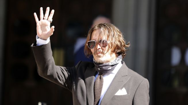 Johnny Depp hadiri sidang kasus pencemaran nama baik.(Anadolu Agency/Ilyas Tayfun Salci)