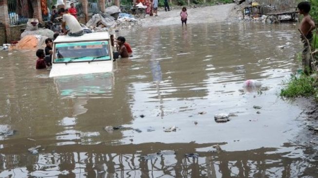 Banjir melanda sejumlah wilayah di Nepal akibat hujan deras yang terjadi sejak Jumat (10/7/2020). [AFP]