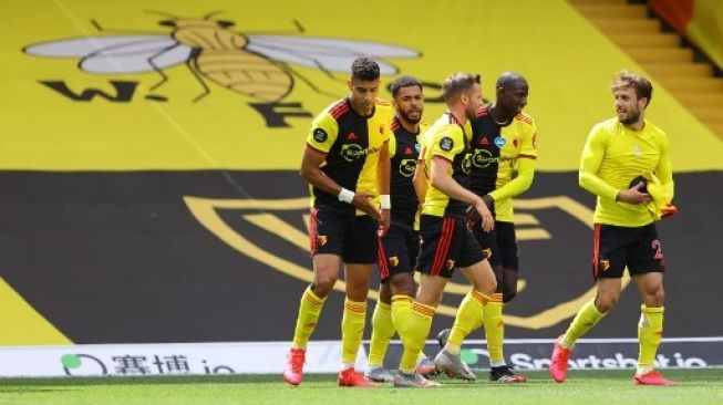 Pemain Watford rayakan kemenangan atas Newcastle United dalam pertandingan pekan ke-35 Liga Inggris musim 2019/20 yang berlangsung di Vicarage Road, Sabtu (11/7/2020). [AFP]