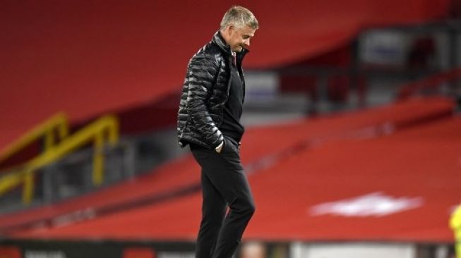 Reaksi manajer Manchester United Ole Gunnar Solskjaer setelah skuatnya ditahan imbang Southampton 2-2 dalam lanjutan Liga Inggris di Old Trafford. PETER POWELL / POOL / AFP