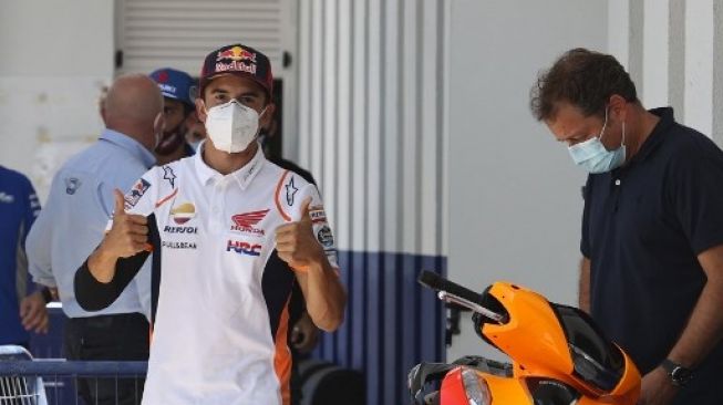Marc Marquez siap kembali membalap setelah menjalani operasi menyusul kecelakaan di Sirkuit Jerez, Minggu (19/7/2020). [AFP]