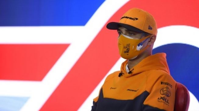 Pembalap McLaren Lando Norris saat jumpa pers menjelang balapan F1 GP Inggris. Rudy Carezzevoli / POOL / AFP