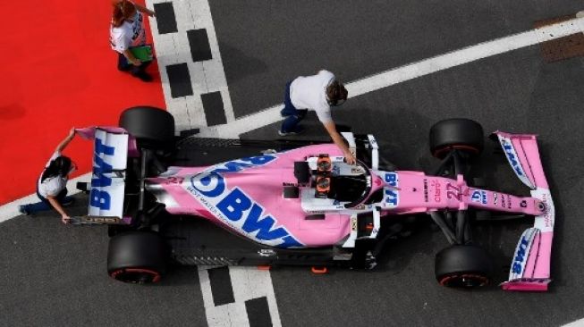 Pembalap Racing Point Nico Hulkenberg (kiri) usai kualifikasi F1 GP 70th Anniversary di Silverstone. ANDREW BOYERS / POOL / AFP