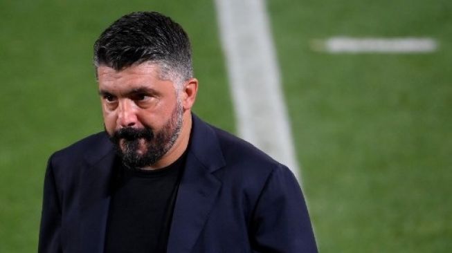 Gennaro Gattuso saat masih melatih Napoli usai skuatnya dikalahkan Barcelona usai laga leg kedua Liga Champions di Camp Nou stadium. LLUIS GENE / AFP