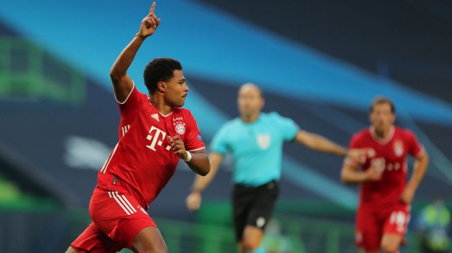 
]
Gelandang Bayern Muenchen Serge Gnabry (kanan) merayakan dengan penyerang Bayern Muenchen Thomas Mueller setelah mencetak gol selama pertandingan sepak bola semifinal Liga Champions antara Lyon melawan Bayern Muenchen di Stadion Jose Alvalade, Lisbon, Portugal, Kamis (20/8/2020) dini hari WIB.  [Miguel A. Lopes / POOL / AFP]