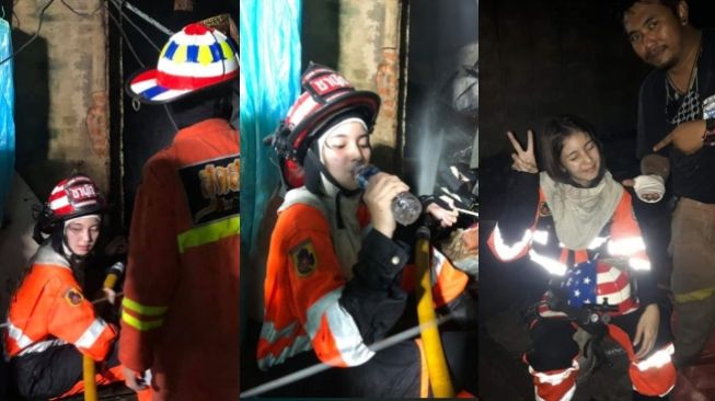 Viral petugas damkar cantik bertugas di tengah kebakaran (Facebook)
