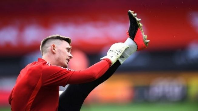 Penjaga gawang Manchester United Dean Henderson mengikuti sesi latihan pada 20 Juli 2020 di Old Trafford. [AFP]