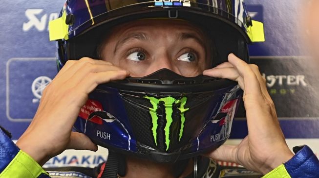 Pebalap Monster Energy Yamaha, Valentino Rossi. [ANDREAS SOLARO / AFP]