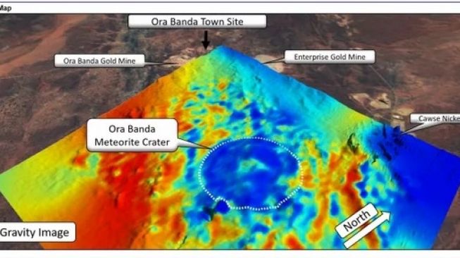 Situs Ora Banda Impact Crater dengan kode warna gravitasinya. Kawah berada di area biru yang ditandai lingkaran [Live Science (c) Resource Potentials].