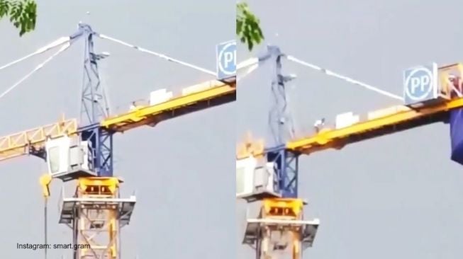 Pria Ini Salat di Atas Crane, Warganet: Kalau Jatuh Husnul Khotimah Gak Sih