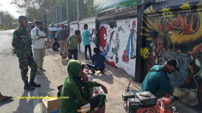 Kodim 1605/Belu Kampanye Cegah Covid-19 Lewat Lomba Grafiti
