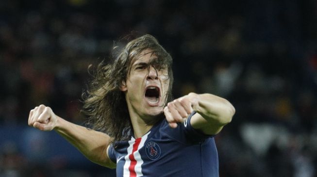 Edinson Cavani saat masih memperkuat PSG pada Februari 2020 lalu. [GEOFFROY VAN DER HASSELT / AFP]