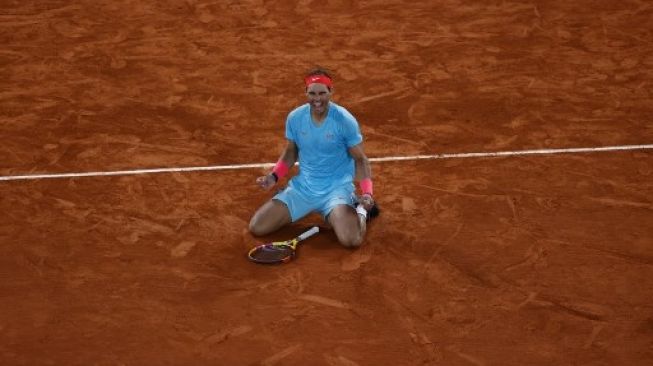 Ekspresi kegembiraan Rafael Nadal setelah menang atas Novak Djokovic di final tunggal putra Frenceh Open di Philippe Chatrier court, Paris. Thomas SAMSON / AFP