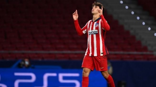 Pemain Atletico Madrid Joao Felix merayakan golnya ke gawang RB Salzburg dalam lanjutan laga Liga Champions di Wanda Metropolitano stadium. GABRIEL BOUYS / AFP