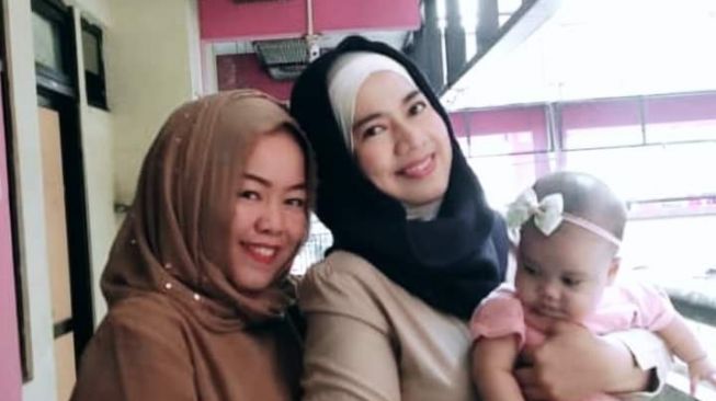 Korban Titik (Kanan) yang dihabisi oleh tetangganya sendiri [Moeslem/suara.com]