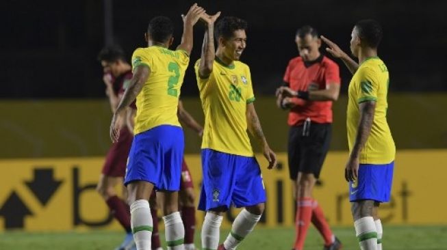 Roberto Firmino saat mencetak gol tunggal buat kemenangan Brasil atas Venezuela. (NELSON ALMEIDA / AFP / POOL)