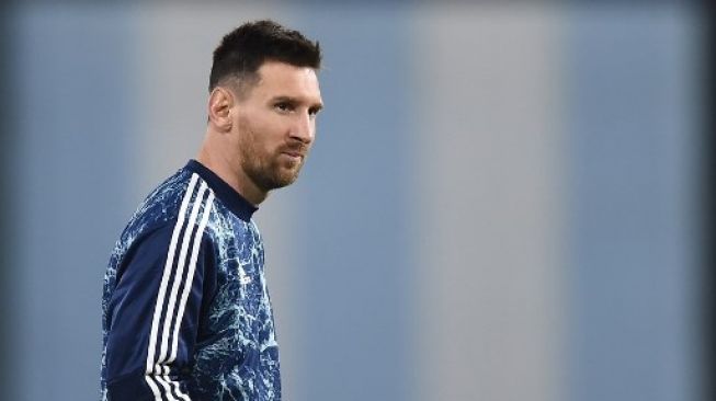 Kapten Timnas Argentina Lionel Messi melakukan pemanasan jelang pertandingan kualifikasi Piala Dunia 2022 kontra Paraguay pada 12 November 2020. [AFP]