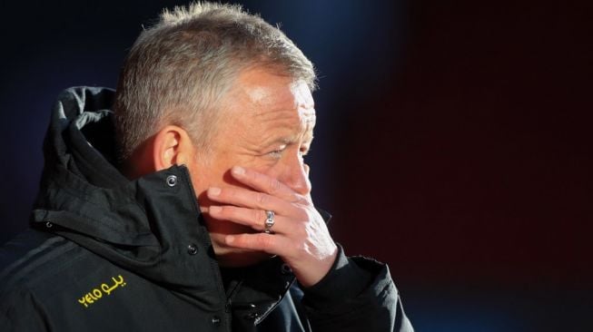 Ekspresi kekecewaan manajer Sheffield United, Chris Wilder pada laga Liga Inggris 2020/2021 kontra West Ham United di Bramall Lane, South Yorkshire, Minggu (22/11/2020) malam WIB. [MIKE EGERTON / POOL / AFP]