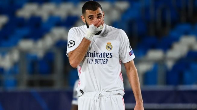 Penyerang Real Madrid, Karim Benzema. [GABRIEL BOUYS / AFP]