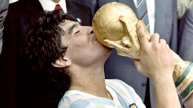 Diego Maradona saat menjuarai Piala Dunia 1986 bersama Timnas Argentina di Meksiko. [Old file/STAFF / AFP]