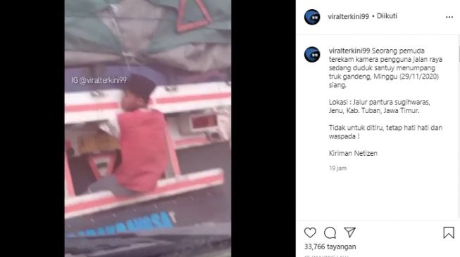 Viral Pemuda Duduk Santai di Ekor Truk Gandeng, Warga: Nge-prank Malaikat