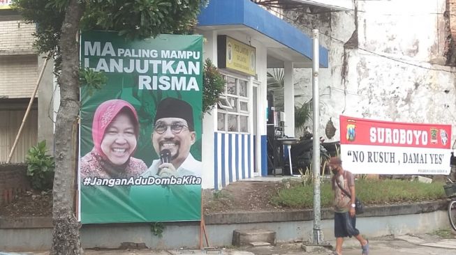 Anak Risma Marah dan Protes Foto Ibunya Dipasang di Baliho Mahfud Arifin