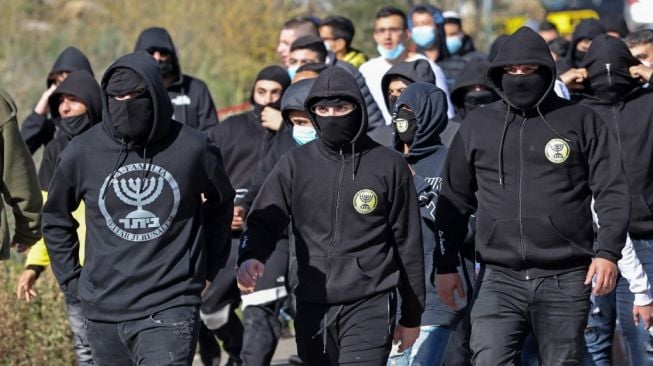 Suporter garis keras Beitar Jerusalem, La Familia. [Emmanuel DUNAND / AFP]