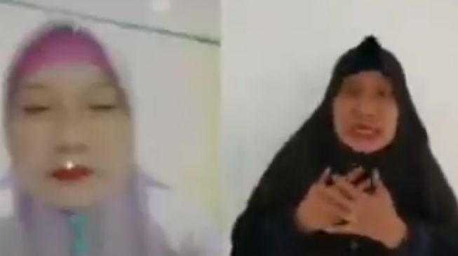 Ratu Wiraksini, Emak-emak berjilbab menghina polisi dengan sebutan dajjal. 