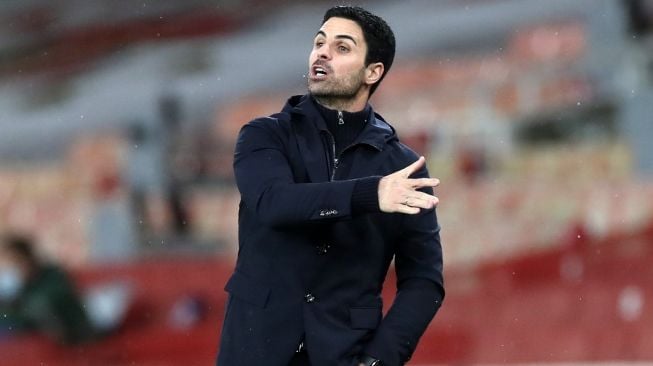 Gestur pelatih Arsenal, Mikel Arteta pada laga Liga Inggris 2020/2021 kontra Southampton di Emirates Stadium, London, Kamis (17/12/2020) dini hari WIB. [PETER CZIBORRA / POOL / AFP]